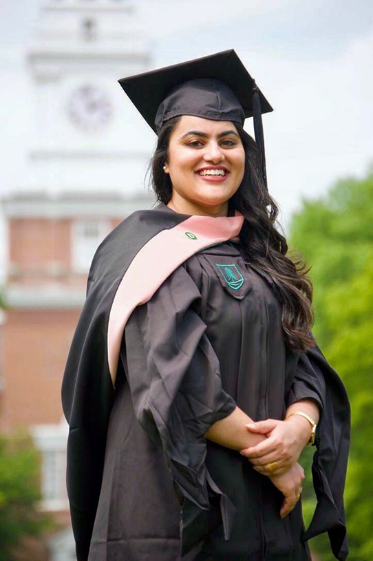 In place of traditional hooding, Jasmine Multani MPH'20 and her classmates shared candid photos they took of themselves in their regalia.